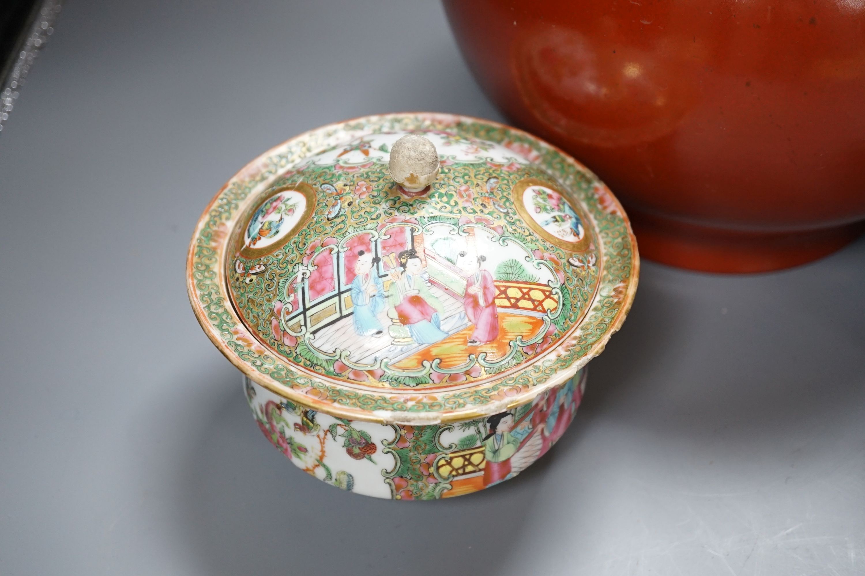 A 19th century Chinese famille rose pot and cover, 15cm diam., together with a decorative Chinese jug and large monochrome china pot